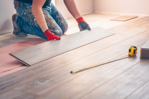 Working To Install Hardwood Floors