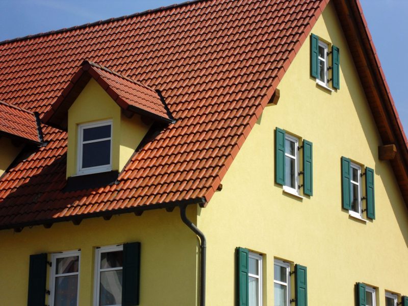 A new and fresh build house looking graceful with maroon and skin paint