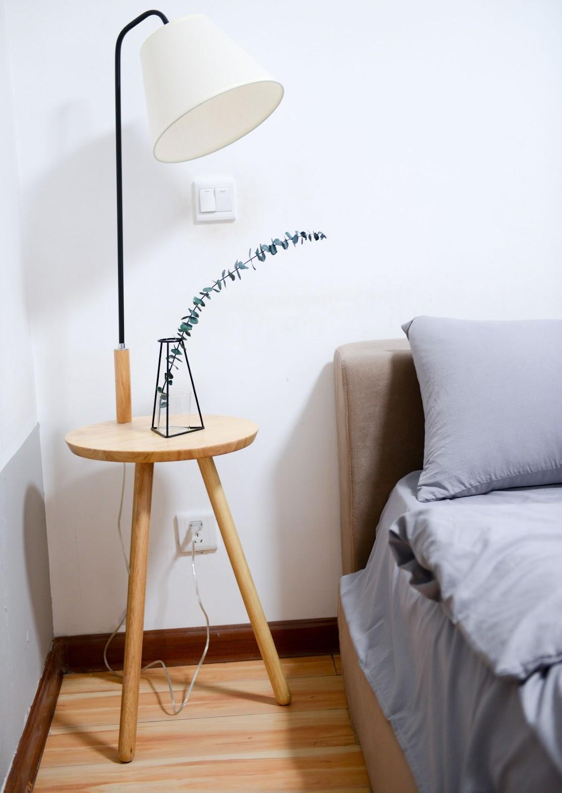 A normal simple lamp is placed at bed side