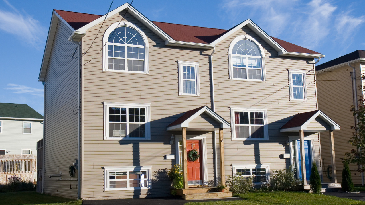 A double-story, side-by-side duplex