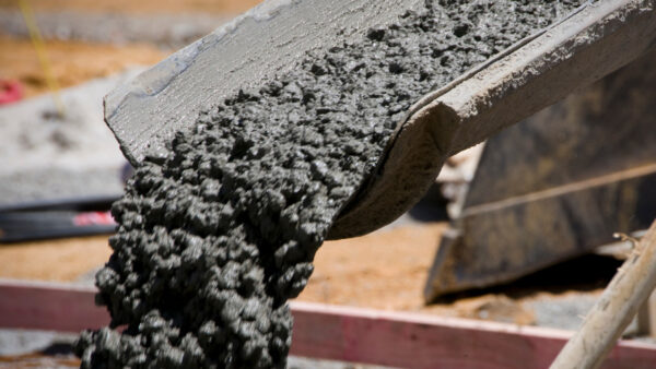 Concrete pouring into formwork