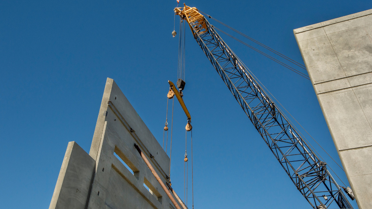 Crane tilting up a panel