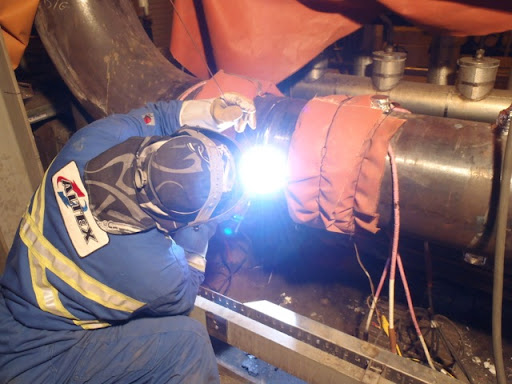 welders working in oil industry