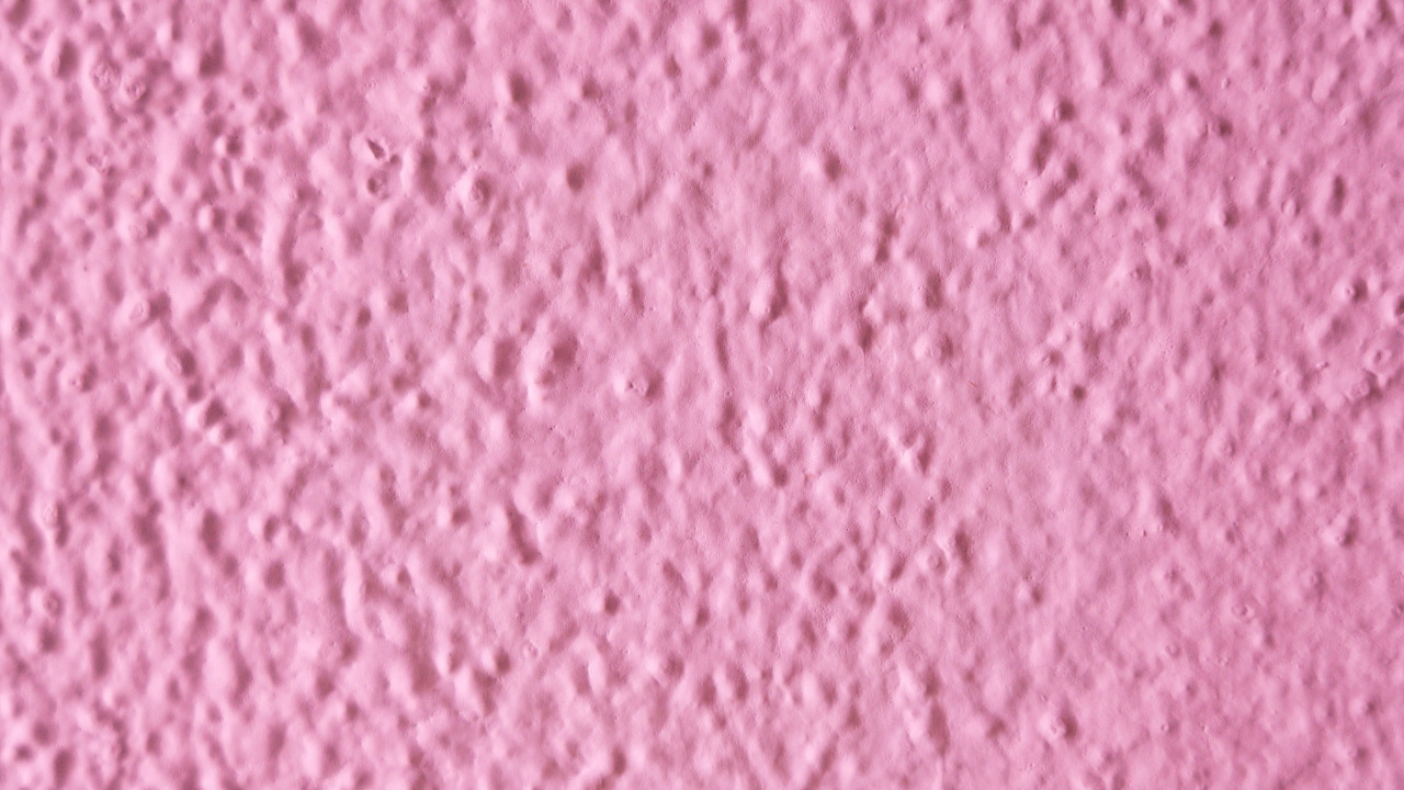 Pink-colored popcorn ceiling texture