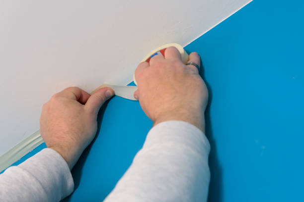 Pasting painter's tape as wall-ceiling intersection