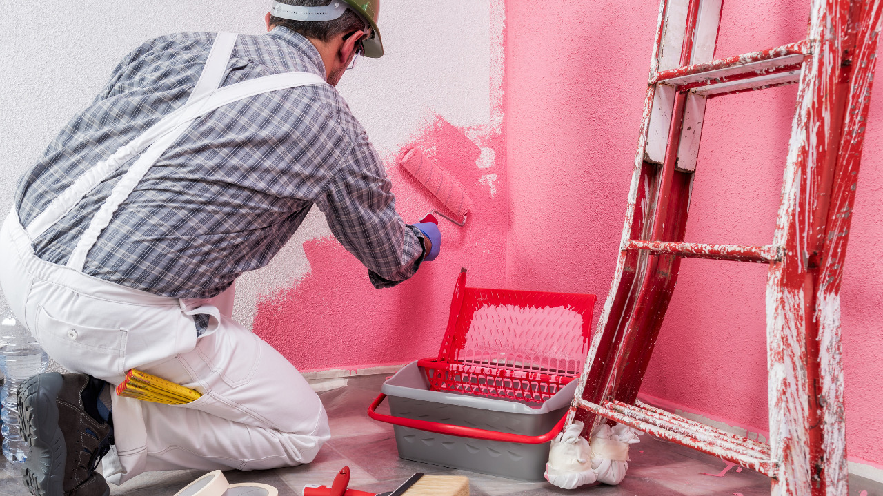 guy doing wall painting